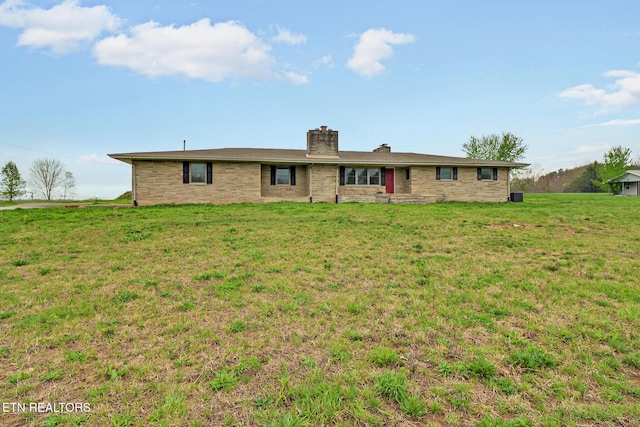 1128 Allardt Hwy, Jamestown, TN 38556 - back of property with a chimney and a yard