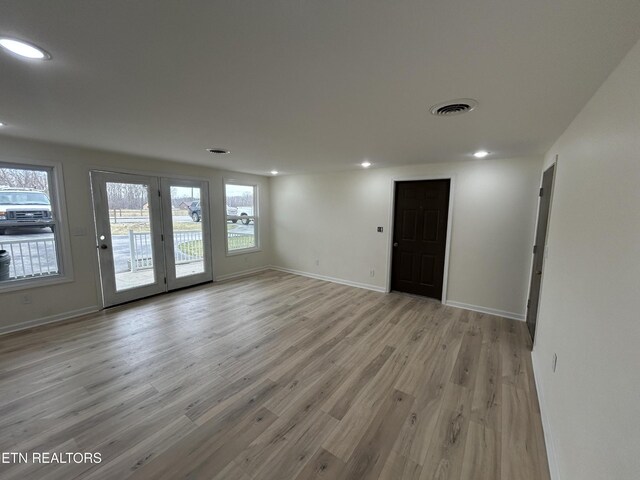 1462 Pennsylvania Ave, Jamestown, TN 38556 - empty room featuring light wood-style flooring, baseboards, and recessed lighting