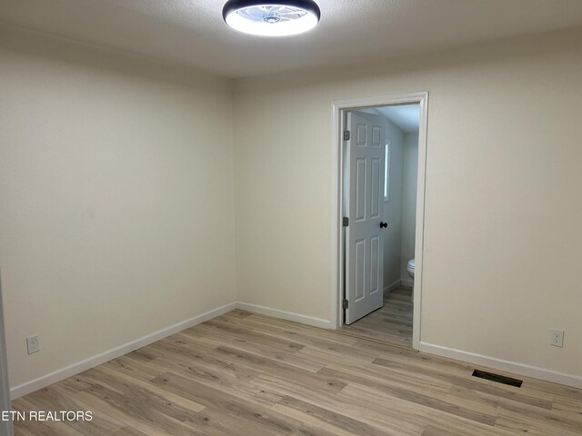 1462 Pennsylvania Ave, Jamestown, TN 38556 - empty room featuring light wood-style flooring and baseboards
