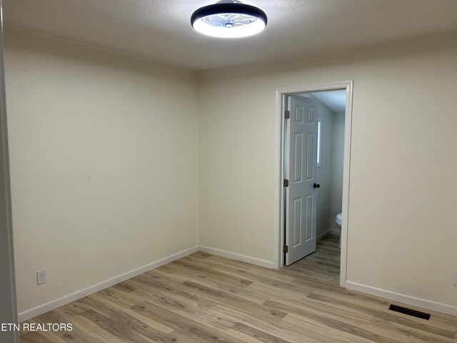 1462 Pennsylvania Ave, Jamestown, TN 38556 - unfurnished room with light wood-style floors and baseboards