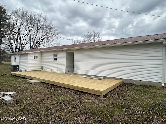 1462 Pennsylvania Ave, Jamestown, TN 38556 - back of property featuring a deck, metal roof, and central air condition unit