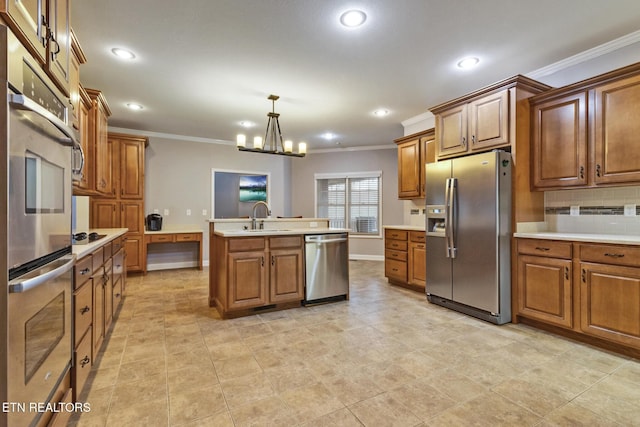 5424 Wilder Rd, Grimsley, TN 38565 - kitchen featuring stainless steel appliances, ornamental molding, a sink, brown cabinets, and light countertops