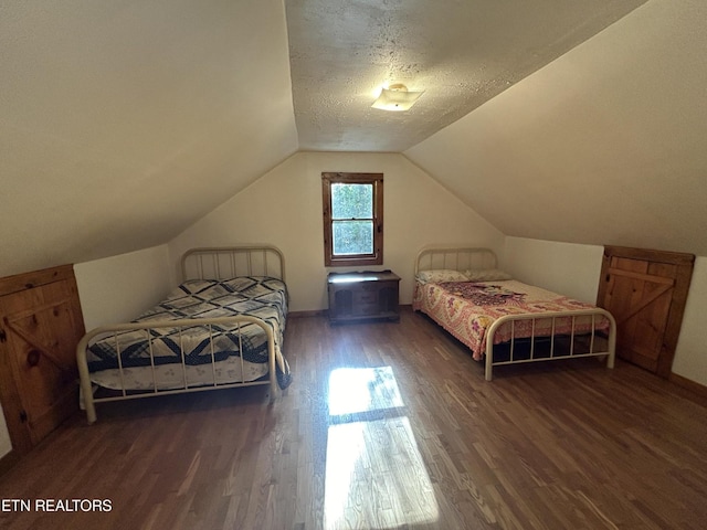 301 Joe Barnett Rd, Jamestown, TN 38556 - bedroom with wood finished floors, lofted ceiling, and baseboards
