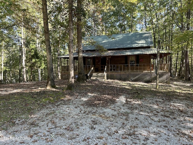 301 Joe Barnett Rd, Jamestown, TN 38556 - view of front of house featuring covered porch and metal roof