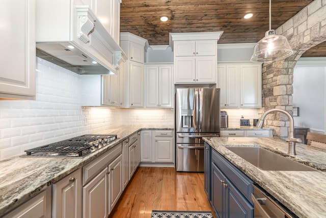 3013 Berry Patch Trl, Rockvale, TN 37153 - kitchen featuring stainless steel appliances, custom range hood, a sink, white cabinets, and wood ceiling
