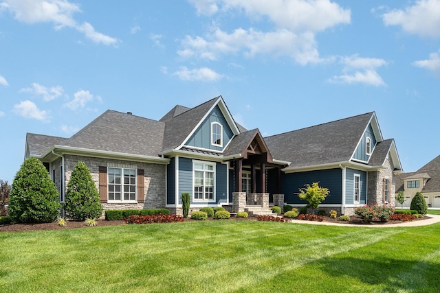 3013 Berry Patch Trl, Rockvale, TN 37153 - craftsman inspired home with stone siding, board and batten siding, a front yard, and a shingled roof