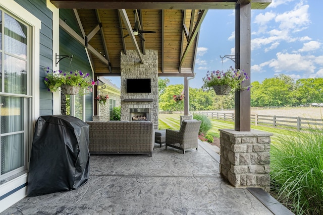 3013 Berry Patch Trl, Rockvale, TN 37153 - view of patio with a ceiling fan, area for grilling, and an outdoor living space with a fireplace
