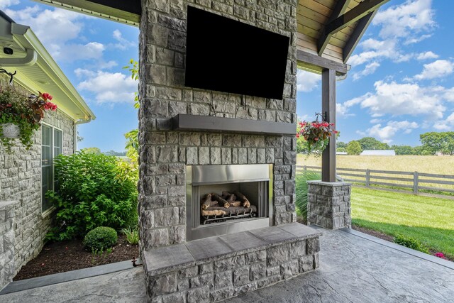 3013 Berry Patch Trl, Rockvale, TN 37153 - view of patio / terrace with an outdoor stone fireplace