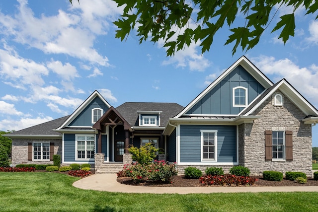 3013 Berry Patch Trl, Rockvale, TN 37153 - craftsman house featuring stone siding, board and batten siding, and a front lawn