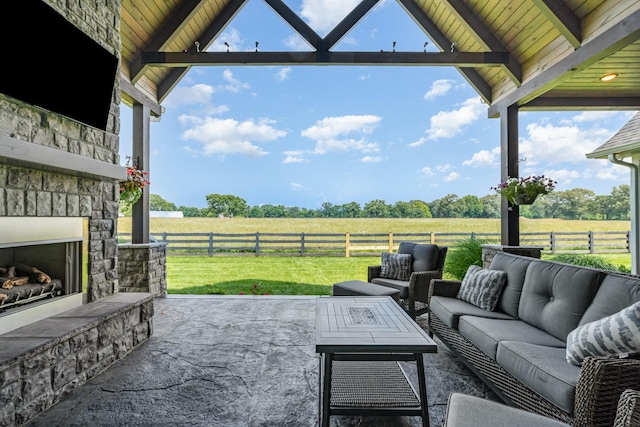 3013 Berry Patch Trl, Rockvale, TN 37153 - view of patio with a view of countryside and an outdoor living space with a fireplace