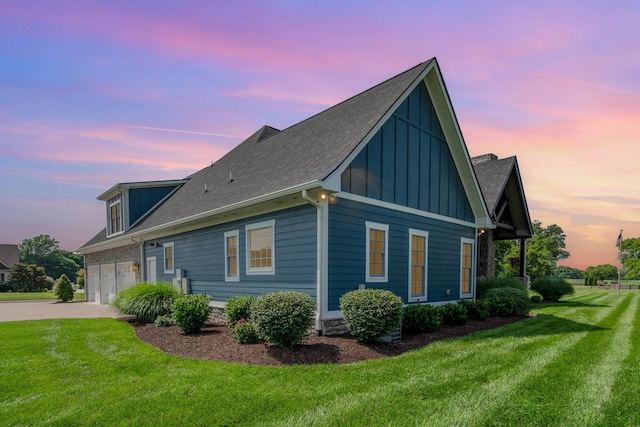 3013 Berry Patch Trl, Rockvale, TN 37153 - view of home's exterior with board and batten siding, a lawn, driveway, and roof with shingles