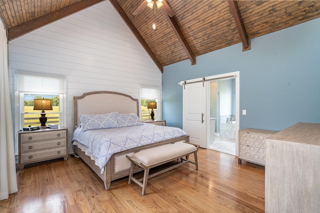 3013 Berry Patch Trl, Rockvale, TN 37153 - bedroom featuring wood ceiling with exposed beams, a barn door, light wood-style flooring, high vaulted ceiling, and ensuite bath