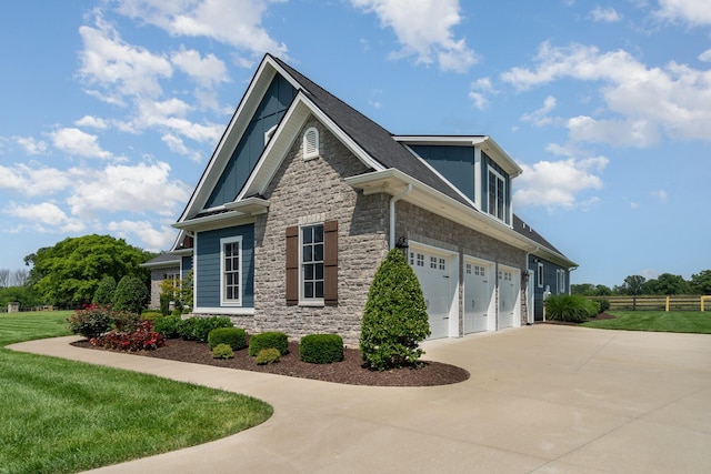 3013 Berry Patch Trl, Rockvale, TN 37153 - view of property exterior featuring stone siding, a garage, and driveway