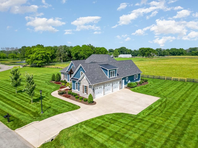 3013 Berry Patch Trl, Rockvale, TN 37153 - view of front of house featuring driveway, stone siding, and view of scattered trees