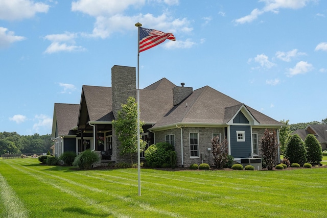 3013 Berry Patch Trl, Rockvale, TN 37153 - craftsman inspired home featuring a front yard, a chimney, central air condition unit, stone siding, and roof with shingles