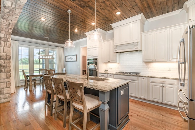 3013 Berry Patch Trl, Rockvale, TN 37153 - kitchen featuring wooden ceiling, a sink, appliances with stainless steel finishes, crown molding, and white cabinetry