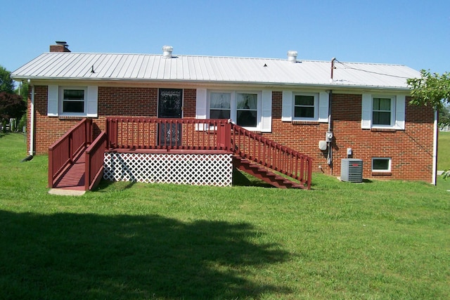 7985 Francis Ferry Rd, Rock Island, TN 38581 - rear view of property featuring cooling unit, a yard, and brick siding