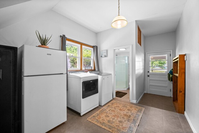 6085 Blue Springs Rd, Cadiz, KY 42211 - washroom with washer and dryer, tile patterned floors, and baseboards
