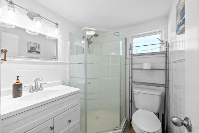 6085 Blue Springs Rd, Cadiz, KY 42211 - bathroom with tile walls, toilet, vanity, a stall shower, and backsplash