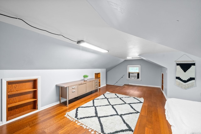 6085 Blue Springs Rd, Cadiz, KY 42211 - additional living space featuring vaulted ceiling, wood finished floors, and baseboards