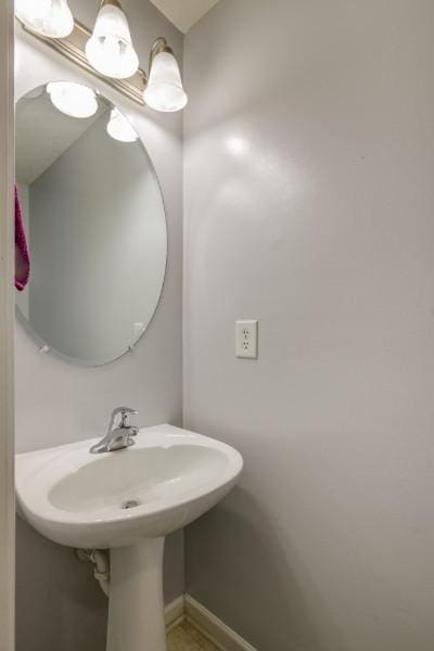5035 Preserve Blvd, Antioch, TN 37013 - bathroom with a sink and baseboards