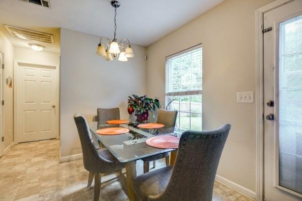 5035 Preserve Blvd, Antioch, TN 37013 - dining area featuring plenty of natural light, baseboards, and a chandelier