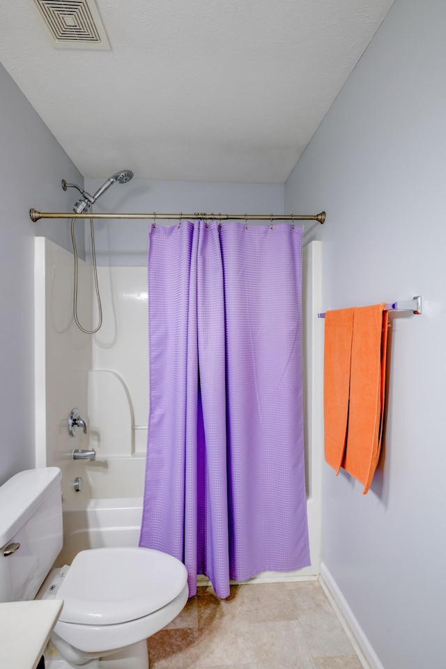 5035 Preserve Blvd, Antioch, TN 37013 - full bathroom with toilet, shower / bath combo, and baseboards
