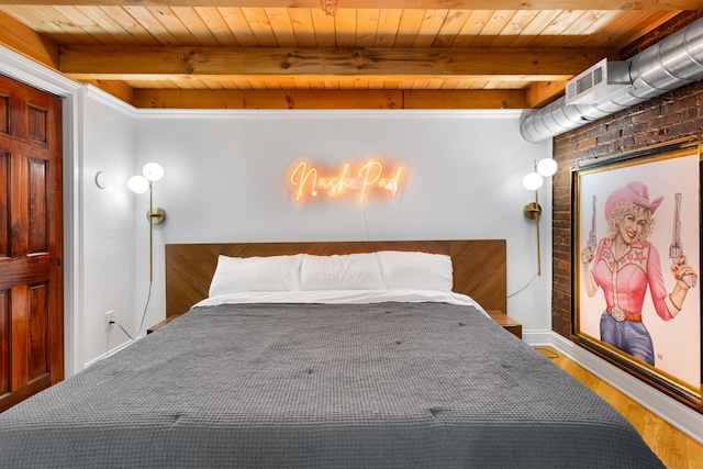 207 3rd Ave N Unit 602, Nashville, TN 37201 - bedroom with wood finished floors, wood ceiling with exposed beams, and baseboards