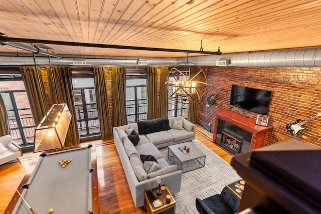207 3rd Ave N Unit 602, Nashville, TN 37201 - living area with wood ceiling, wood finished floors, a chandelier, and pool table