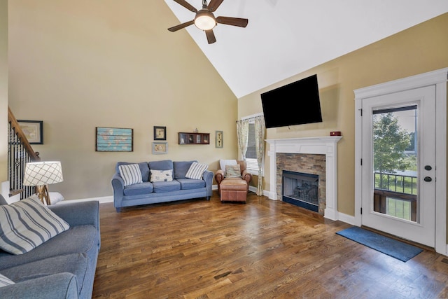 2122 Slater Dr, Murfreesboro, TN 37128 - living area with a ceiling fan, high vaulted ceiling, wood finished floors, a stone fireplace, and baseboards