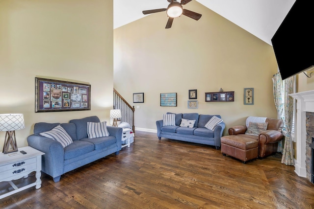 2122 Slater Dr, Murfreesboro, TN 37128 - living room featuring high vaulted ceiling, ceiling fan, a fireplace, stairway, and wood finished floors