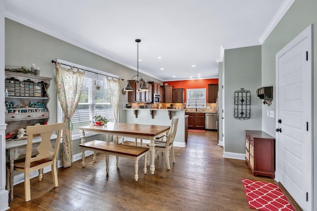 2122 Slater Dr, Murfreesboro, TN 37128 - dining space featuring dark wood-style floors, ornamental molding, baseboards, and recessed lighting
