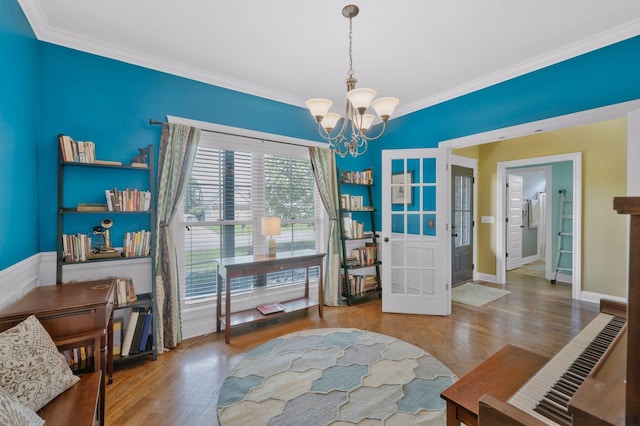 2122 Slater Dr, Murfreesboro, TN 37128 - dining room with a chandelier, wood finished floors, ornamental molding, and baseboards