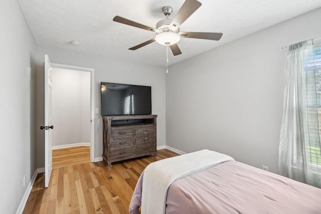3207 Gardendale Dr, Franklin, TN 37064 - bedroom featuring light wood-style floors, baseboards, and multiple windows