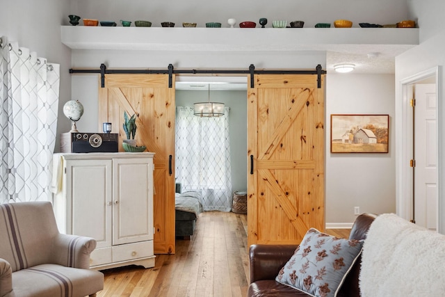 3207 Gardendale Dr, Franklin, TN 37064 - living room featuring a barn door and light wood finished floors