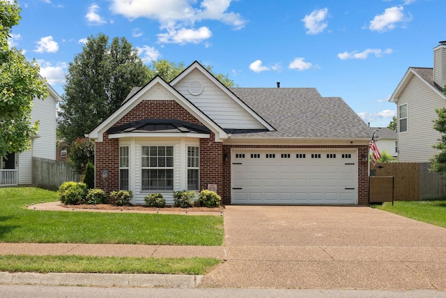 3207 Gardendale Dr, Franklin, TN 37064 - view of front of house featuring brick siding, a garage, concrete driveway, and roof with shingles