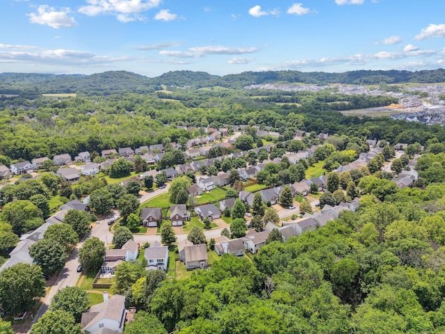 3207 Gardendale Dr, Franklin, TN 37064 - aerial view of residential area featuring a heavily wooded area and a mountainous background