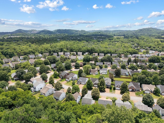 3207 Gardendale Dr, Franklin, TN 37064 - aerial perspective of suburban area featuring a heavily wooded area and mountains