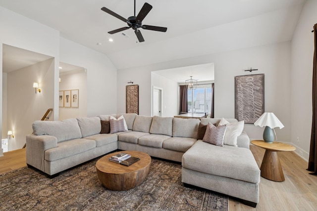 2764 Otterham Dr, Thompsons Station, TN 37179 - living area with light wood-style floors, vaulted ceiling, a ceiling fan, baseboards, and recessed lighting