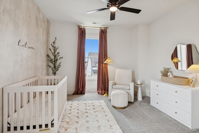 2764 Otterham Dr, Thompsons Station, TN 37179 - carpeted bedroom with a crib and ceiling fan