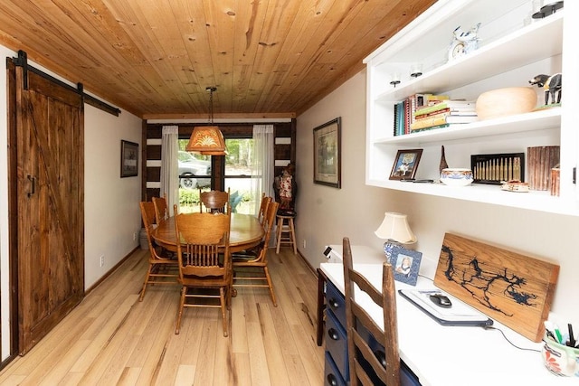 652 Northup Rd, Portland, TN 37148 - dining area with light wood-style flooring, wooden ceiling, and a barn door