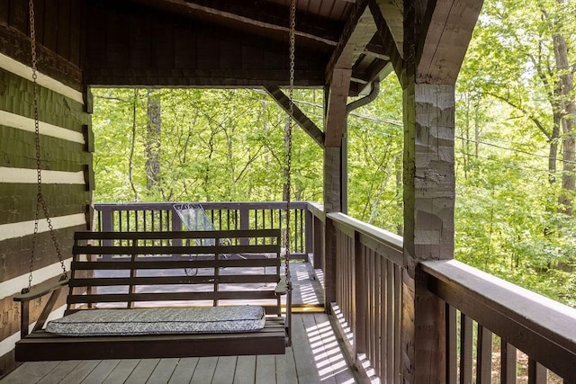 652 Northup Rd, Portland, TN 37148 - wooden deck with a wooded view