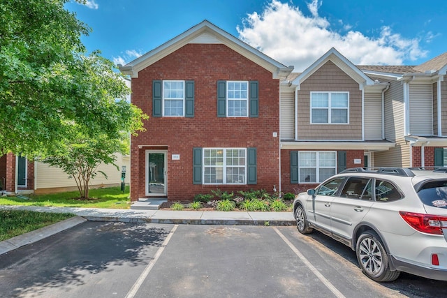2013 Shaylin Loop, Antioch, TN 37013 - view of property featuring uncovered parking and brick siding