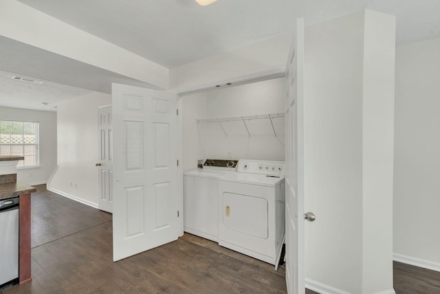 2013 Shaylin Loop, Antioch, TN 37013 - washroom featuring separate washer and dryer, dark wood-type flooring, and baseboards