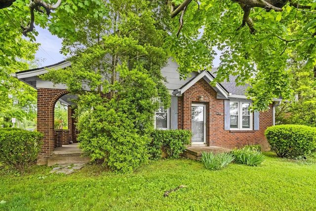 400 Connell St, Springfield, TN 37172 - view of property hidden behind natural elements with brick siding and a front lawn