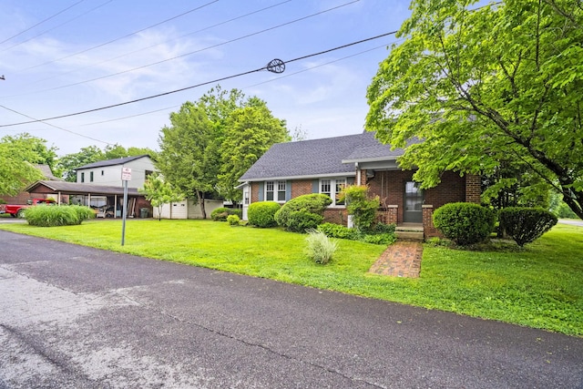 400 Connell St, Springfield, TN 37172 - view of front of property featuring brick siding, a front lawn, and roof with shingles