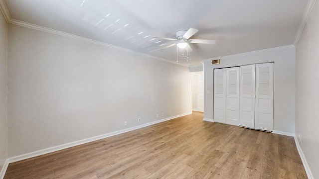 1280 Middle Tennessee Blvd Unit D6, Murfreesboro, TN 37130 - unfurnished bedroom with light wood finished floors, baseboards, crown molding, a closet, and a ceiling fan