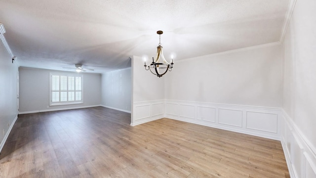 1280 Middle Tennessee Blvd Unit D6, Murfreesboro, TN 37130 - unfurnished room with a chandelier, ceiling fan, light wood-type flooring, crown molding, and a decorative wall