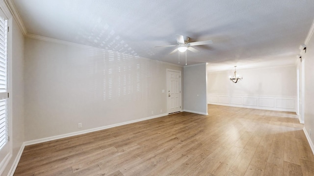 1280 Middle Tennessee Blvd Unit D6, Murfreesboro, TN 37130 - spare room with a ceiling fan, a chandelier, light wood-style floors, ornamental molding, and a decorative wall