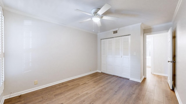 1280 Middle Tennessee Blvd Unit D6, Murfreesboro, TN 37130 - unfurnished bedroom featuring light wood-style floors, a closet, crown molding, baseboards, and ceiling fan